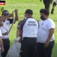 Snake brings football match to a halt in Guatemala after invading pitch