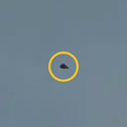 Mysterious UFO spotted floating over city for two hours leaves locals stunned