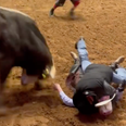 Brave dad jumps on ‘unconscious’ son to protect him from raging bull in rodeo