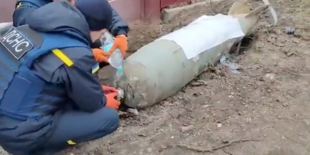 Heart-stopping video shows Ukrainians disabling bomb with bare hands and water bottle