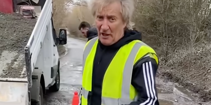 Rod Stewart filling potholes in Harlow