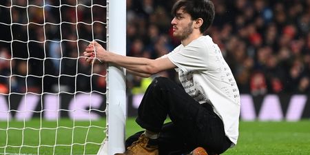 Environmental activist tries to handcuff himself to goal during Arsenal vs Liverpool clash