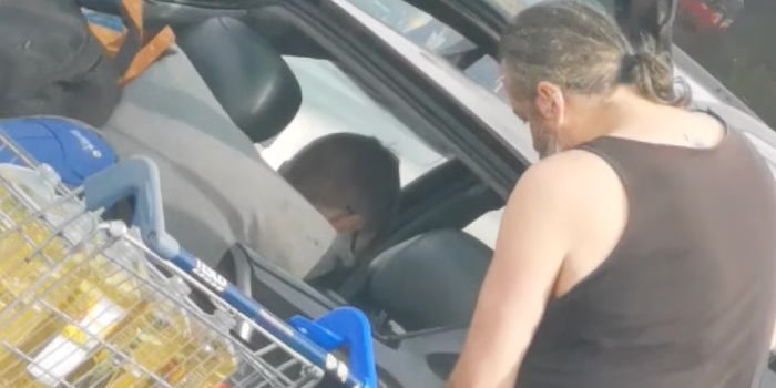 man fills car with cooking oil