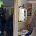 Video shows unexploded missile piece found lodged inside kitchen cupboard in Ukraine