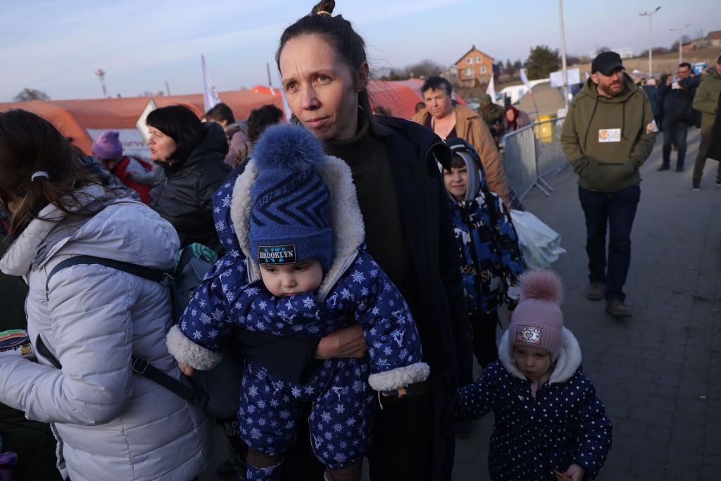 A mother arrives with her children in Poland from war-torn Ukraine at the Medyka border crossing on March 15 (Getty) 