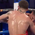 Referee fails to disqualify boxer after he bit opponent on the arm