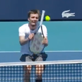 Tennis star pulls off unbelievable trick shot using handle of racket