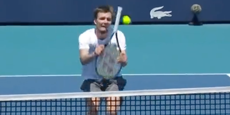 Tennis star pulls off unbelievable trick shot using handle of racket