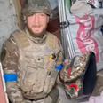 Moment Ukrainian MMA champion recovers championship belt from bombed home