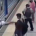 Shocking moment woman faints, falls under moving train and miraculously survives