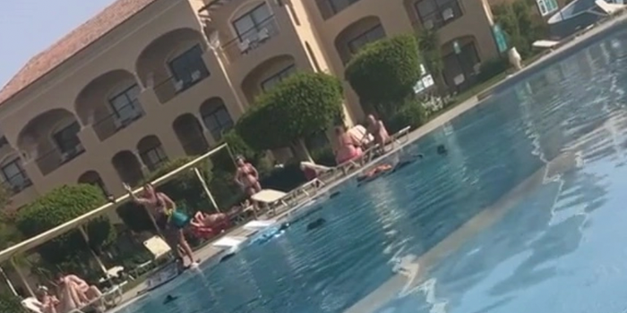 Man caught cheating in Ibiza humiliated by girlfriend who gets dramatic poolside revenge