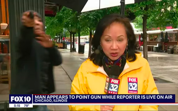 Shocking moment man appears to pull ‘a gun’ on live TV crew during report on gun violence
