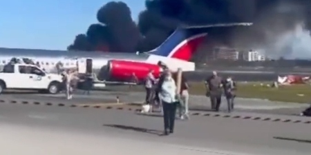 Shocking moment plane crash-lands at Miami Airport and bursts into flames