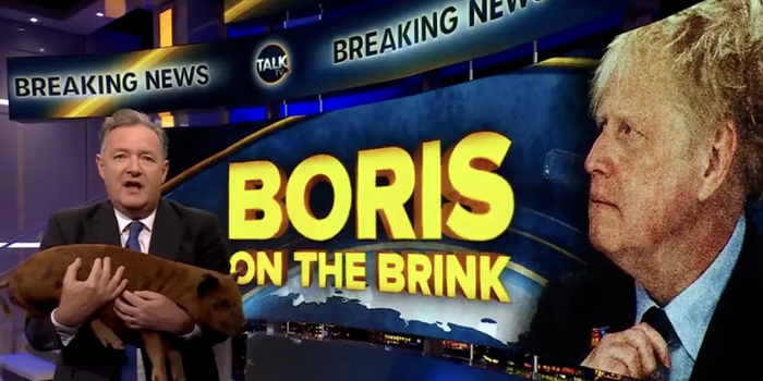 Piers Morgan holding a piglet during his programme in which he states that 'Boris is on the brink'