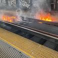 ‘Stray spark’ ignites fire on timber beams blocking major London railway line