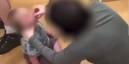 Man and woman arrested after footage appears to show baby given shot of vodka