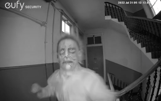Creepy neighbour dancing CCTV footage