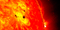 Scientists warn that planet-sized sunspot directed at Earth has grown tenfold
