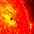 Scientists warn that planet-sized sunspot directed at Earth has grown tenfold