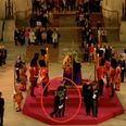 Queen’s guard collapses and falls from coffin podium