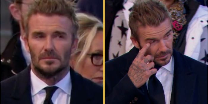 David Beckham cries as he walks past Queen's coffin