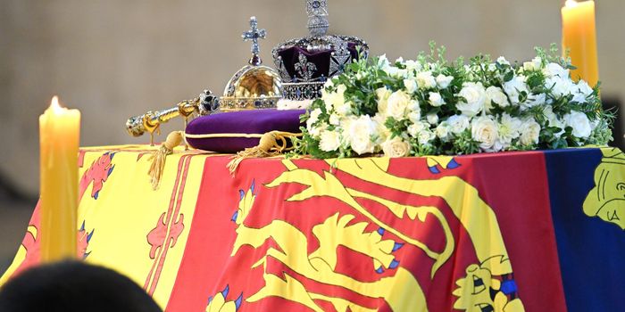 LONDON, ENGLAND - SEPTEMBER 17: The coffin carrying Queen Elizabeth II is draped in the Royal Standard and adorned with the Imperial State Crown and the Sovereign's orb and sceptre, rests in Westminster Hall for the Lying-in State on September 17, 2022 in London, England. Members of the public are able to pay respects to Her Majesty Queen Elizabeth II for 23 hours a day from 17:00 on September 14, 2022 until 06:30 on September 19, 2022. Queen Elizabeth II died at Balmoral Castle in Scotland on September 8, 2022, and is succeeded by her eldest son, King Charles III. (Photo by Karwai Tang/WireImage)