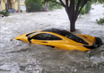 Hurricane Ian washes man’s newly purchased $1 million McLaren out of garage and down street