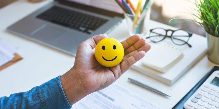 Why you should not keep trying to be happy at work