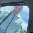 Terrifying moment grinning ‘carjacker’ with machete bangs on car window and demands to be let in