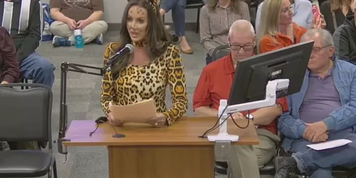 An Arizona mother decided to dress up as a cat for a school board meeting in protest against  the school's so-called "woke agenda."