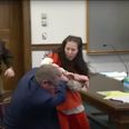 Woman accused of beheading her lover attacks lawyer in court
