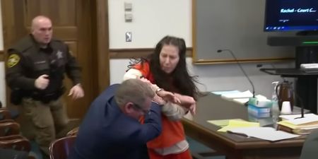 Woman accused of beheading her lover attacks lawyer in court