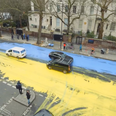 Huge Ukraine flag painted outside Russian embassy in London