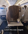 Woman left stunned after plane passenger drapes hair over back of her seat