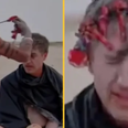 Reporter eats ‘human brain’ with cannibal tribe while wearing crown made out of teeth