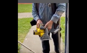 Shocking moment landlord cuts through door with circular saw and lunges at tenant over rent row