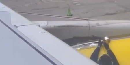 Passenger spots employee putting tape on the wing of a plane before takeoff