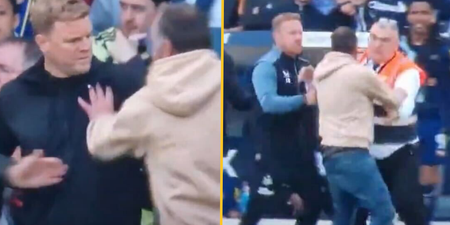 Eddie Howe confronted by pitch invader during Leeds v Newcastle