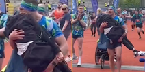 Heartwarming moment Kevin Sinfield lifts Rob Burrow from wheelchair and carries him over marathon finish line