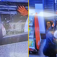 Hilarious moment armed robber gets trapped under shop’s roller shutters