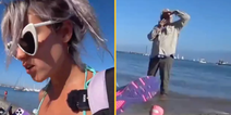 Twitch streamer shocked after catching older man filming her on beach