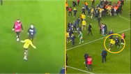 Michy Batshuayi unleashes ‘spinning kick’ on supporters as fans attack players in chaotic game