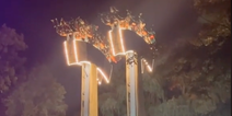 Terrifying moment theme park ride breaks down in mid-air, leaving passengers dangling